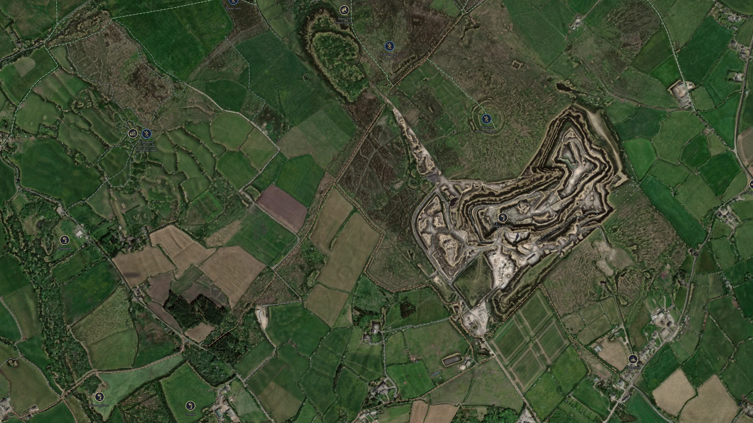Chysauster and Castle-an-Dinas in the app's bare-earth LiDAR reading over the satellite photograph, with its pins and the rights-of-way network